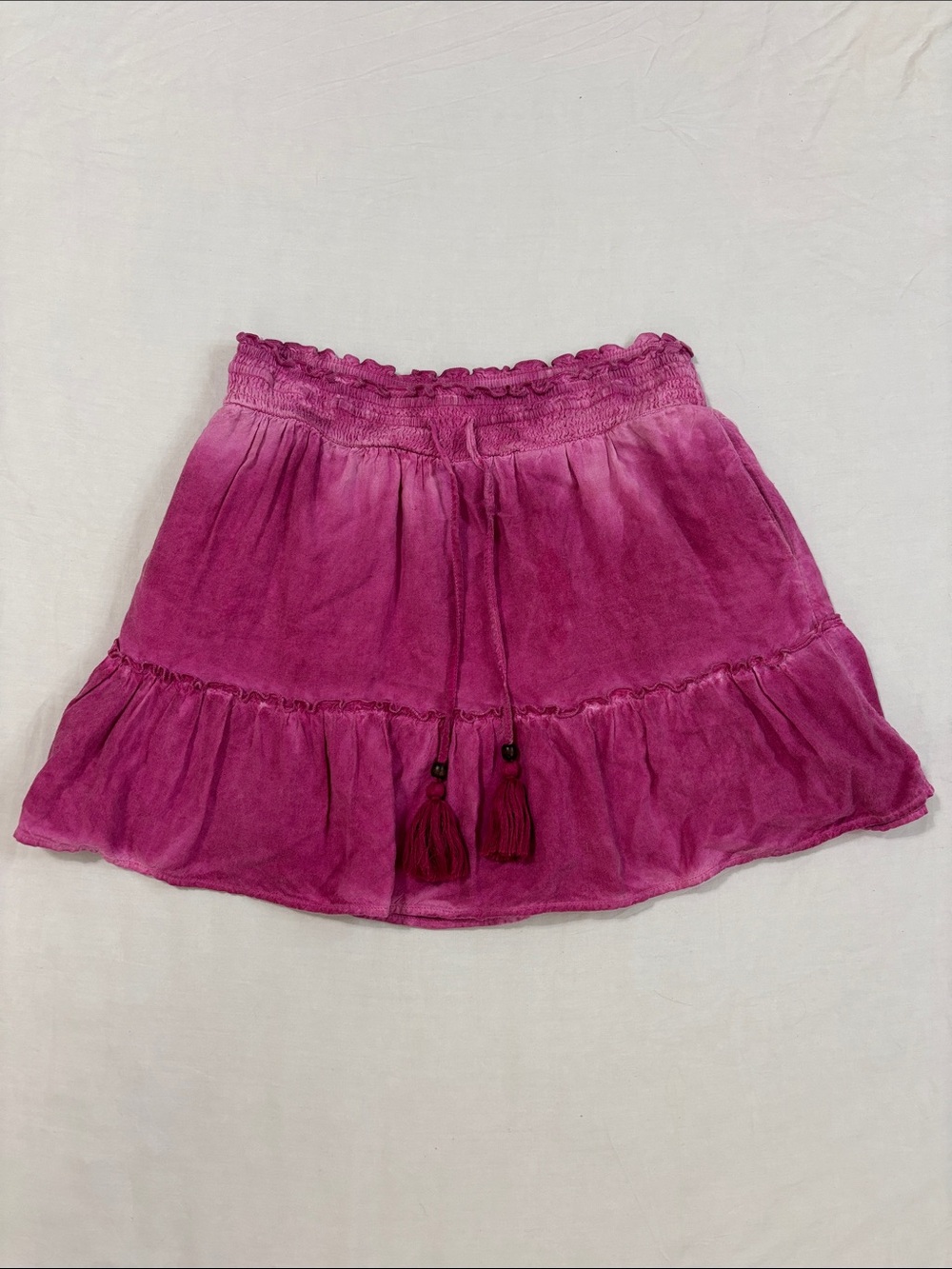 Pilcro by Anthropologie Giulia Mini Skirt with Tassel Detail in Fuchsia Color